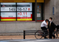Asian stocks stumbled, dollar hovered amid cooling US inflationÂ